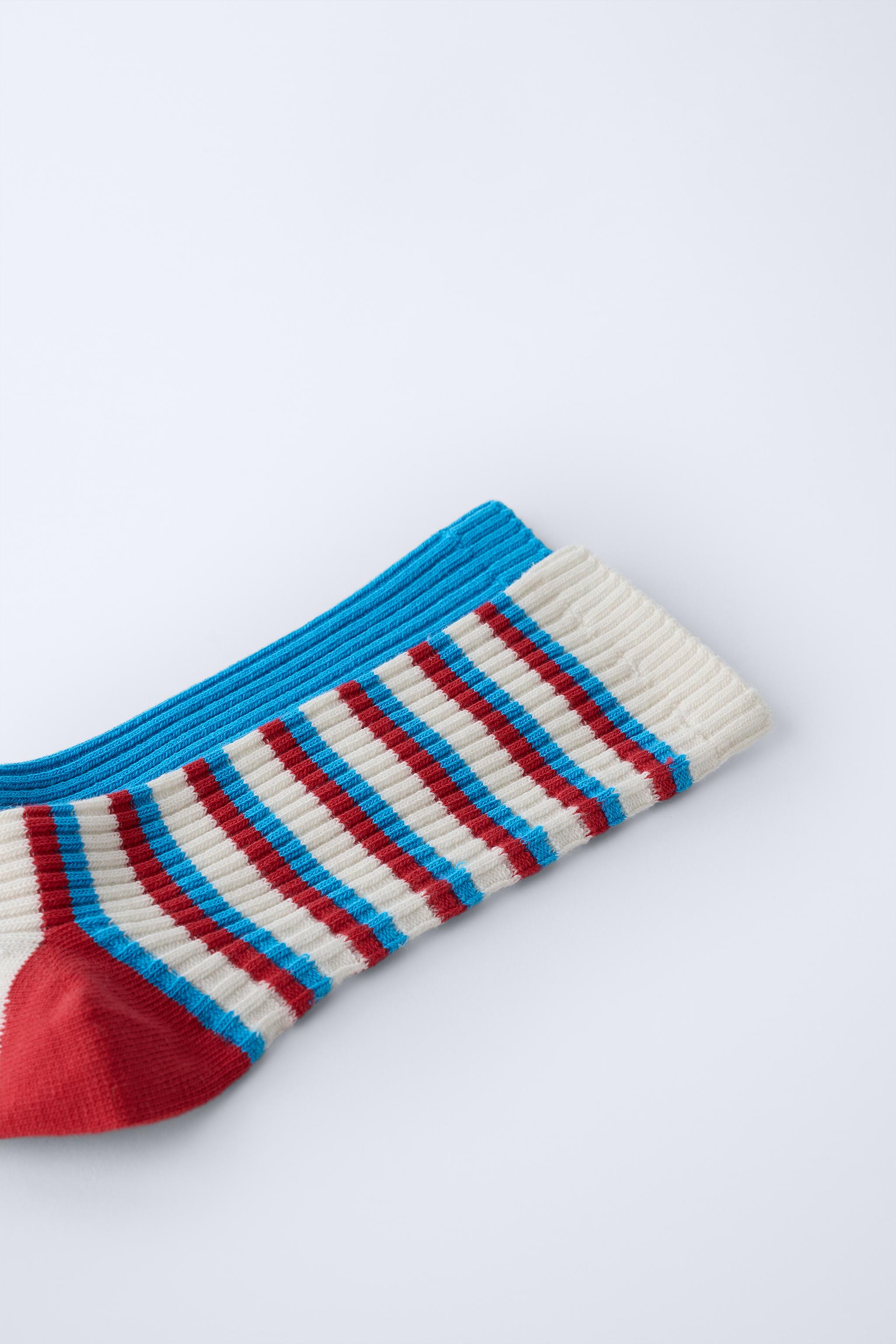 LOT DE DEUX PAIRES CHAUSSETTES LONGUES À RAYURES